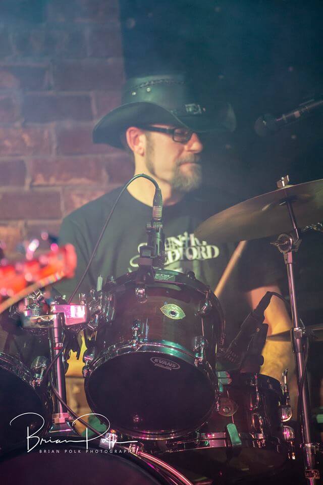 Fed up with singer Scot Bluechevy’s onstage antics, Country Redford drummer weighs in on the band’s future.